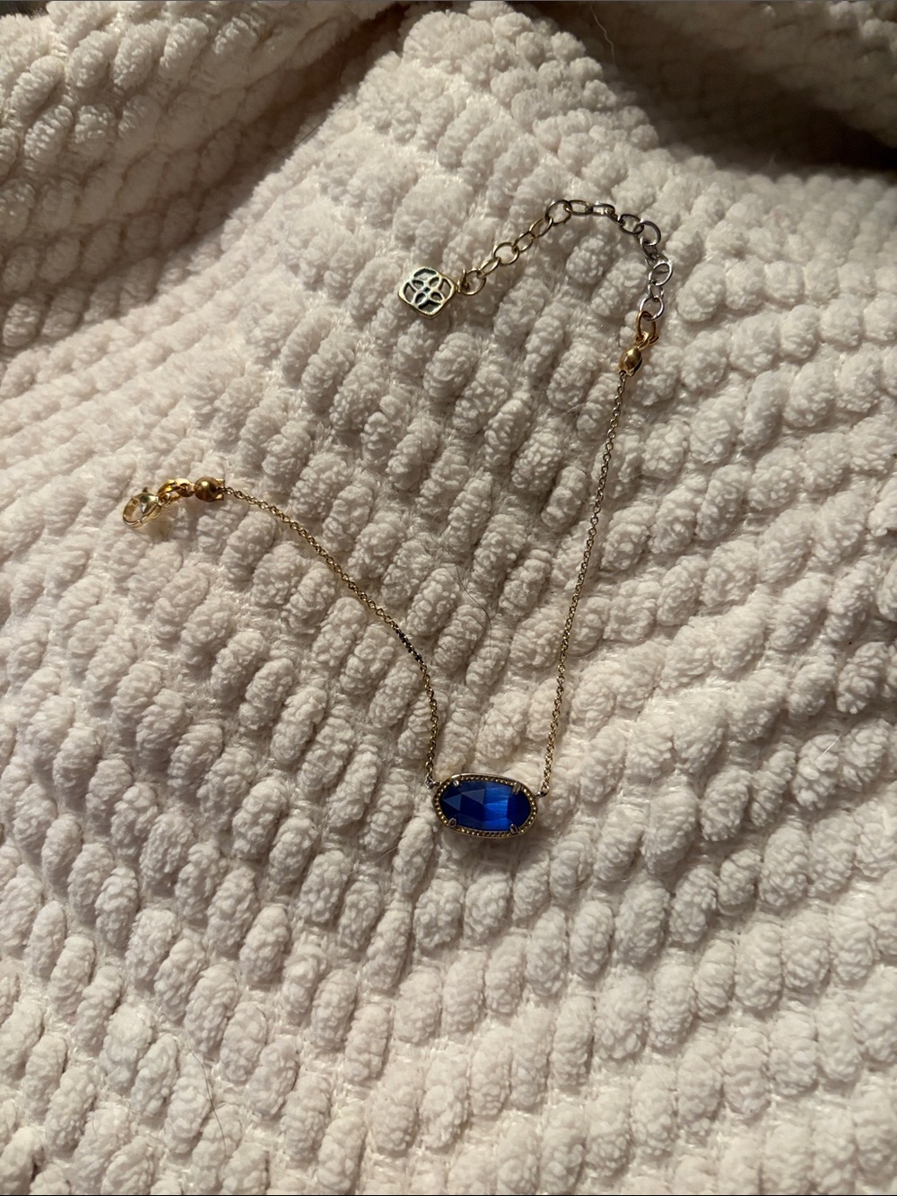 Kendra Scott Gold  bracelet with Deep Blue Oval Stone